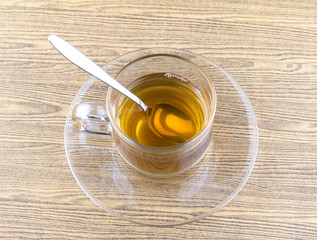 Glass cup tea with spoon