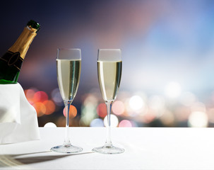 champagne Glasses and night city