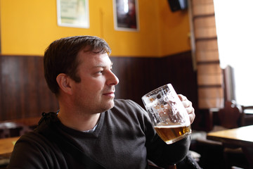 Man with glass of beer