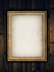 Picture frame on wooden background