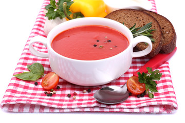 Tasty tomato soup and vegetables, isolated on white