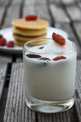 glass of delicious icecream milkshakes and pancake