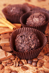 Delicious chocolates on table close-up