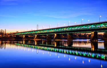 Fototapeta na wymiar Illuminated bridge at night