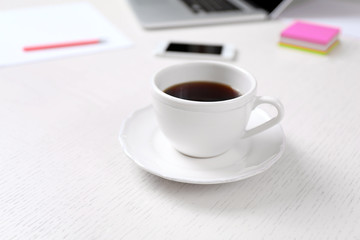 Cup of coffee at workplace