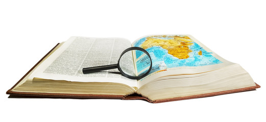 Atlas and encyclopedia with a magnifying glass