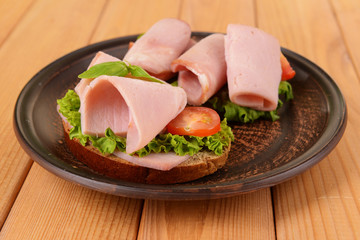 Delicious sandwiches with lettuce and ham