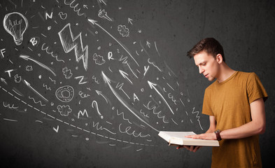 Young man reading a book