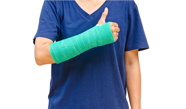 Green cast on hand and arm on white background