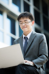 young businessman working outside