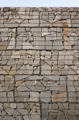 Hintergrund Mauer aus Gabionen