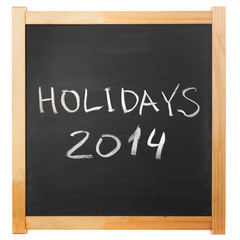 Obraz premium holidays 2014 chalk handwritten on classic blackboard