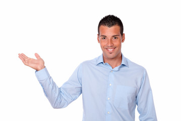 Attractive man holding out his right palm