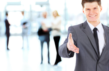 A business man with an open hand ready to seal