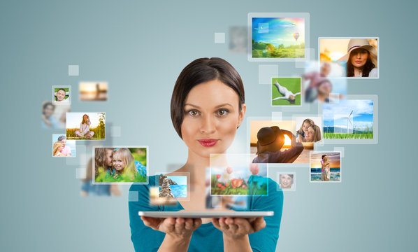 Portrait of young happy woman sharing her photo and video files - Powered by Adobe