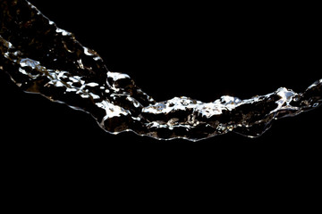 stream of water on a black background