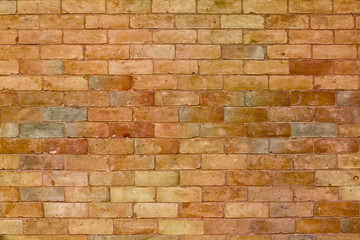 Bricks wall in orange with slightly different tones