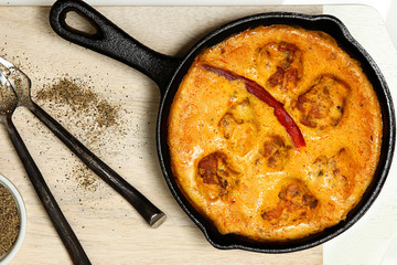 Indain Gram Flour Dumplings in Yogurt Curry Sauce