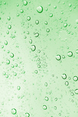water drops on green glass. macro