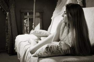 Attractive girl on a sofa