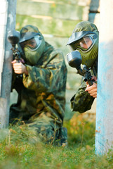 two paintball players