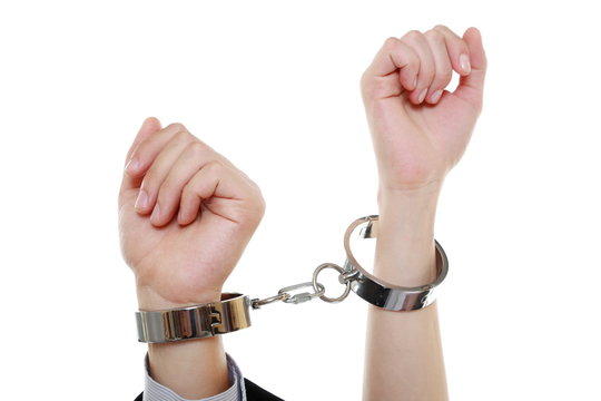 relationship concept female male hands in handcuffs
