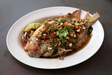 Steamed sea bass with lemon