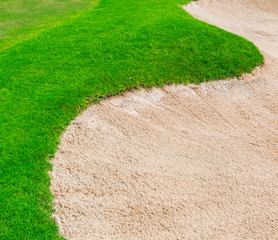 Sand and grass at golf course