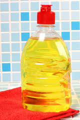 Cleaning bottle on tile