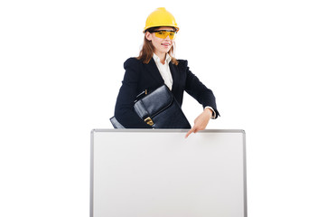 Young builder woman  with portfolio  and  blank board isolated o