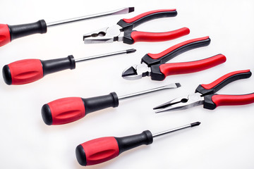 Screwdriver and pliers