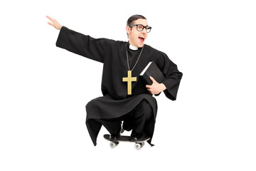 Silly priest riding a small skateboard