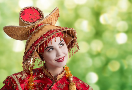 Portrait Of Smiling Woman In Chinese Princess Costume