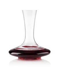 Poster Red wine on a decanter isolated over white background © Gresei
