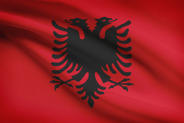 Series of ruffled flags. Albania.
