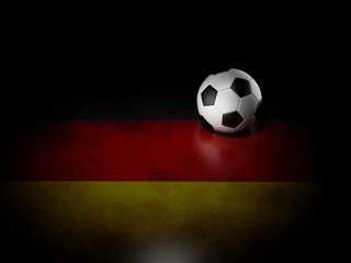Naklejka premium Soccer ball with german flag