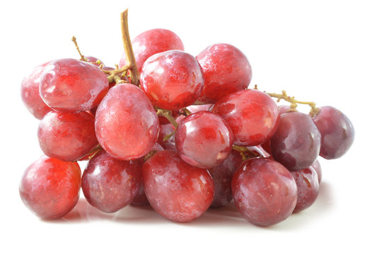 Red grape with water drops, closeup, isolated on white backgroun