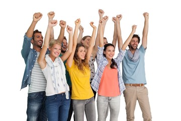 Obraz premium Group of casual happy young people raising hands