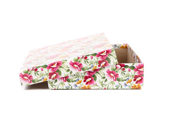 white Gift box with red blue and orange flowers