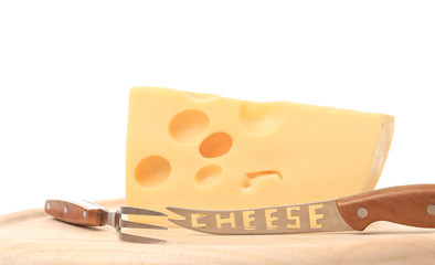 Delicious cheese with fork and knife