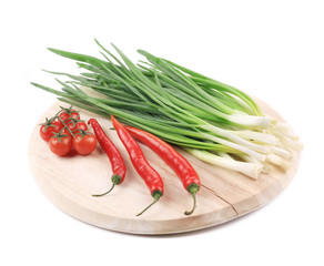 Fresh vegetables on cutting board.