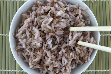 Red rice and chopstick