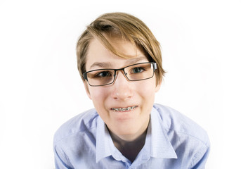 Fototapeta premium Teen in glasses and braces