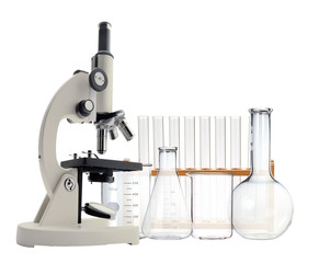 Laboratory metal microscope and test tubes with liquid isolated