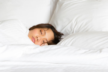 Only show face woman in white blanket tucked sleep on the bed