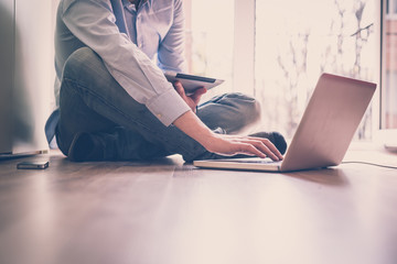 close up hands multitasking man using  laptop