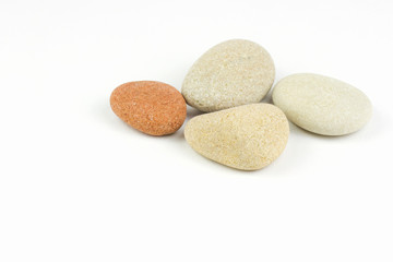 Fototapeta na wymiar Pile of pebbles isolated over white