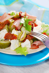 salad with ham,feta and vegetables
