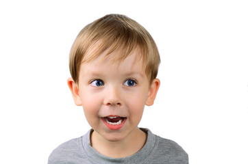 joyful little boy looking away