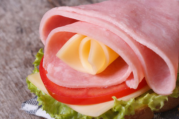 Tasty sandwich of ham and cheese macro